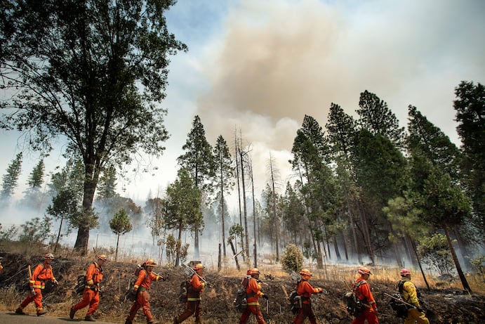 Underpaid firefighters, overstretched budgets: The U.S. isn’t prepared for fires fueled by climate change