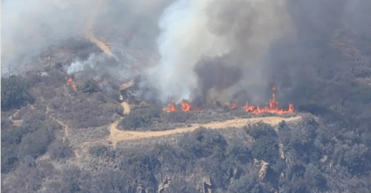 Forward progress of brush fire in Malibu stopped after burning 15 acres, threatening structures